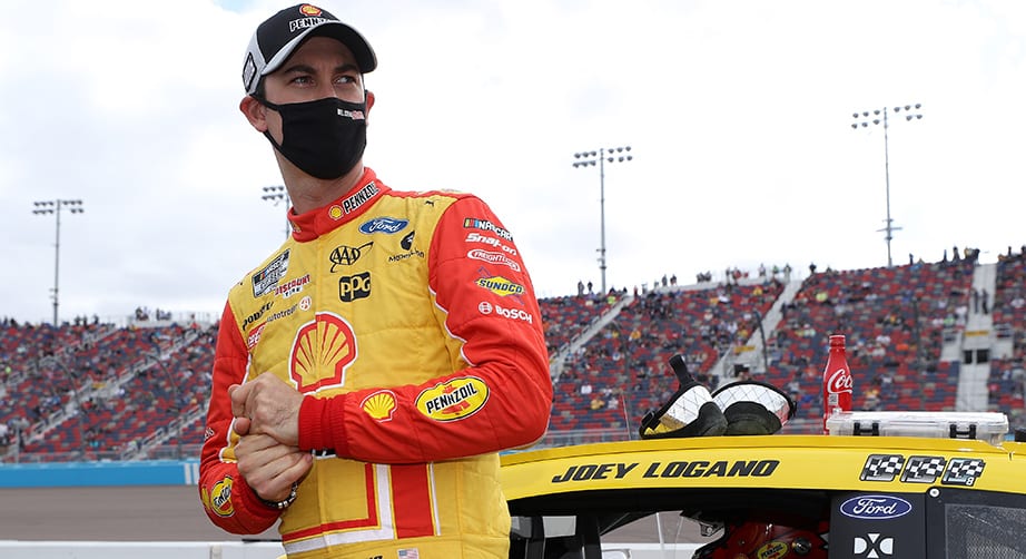 AVONDALE, ARIZONA - NOVEMBER 08: Joey Logano, driver of the #22 Shell Pennzoil Ford, waits on the grid prior to the NASCAR Cup Series Season Finale 500 at Phoenix Raceway on November 08, 2020 in Avondale, Arizona. (Photo by Chris Graythen/Getty Images) | Getty Images