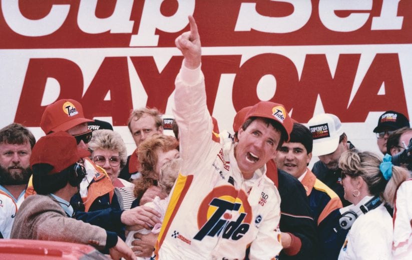 DAYTONA BEACH, FL - FEBRUARY 19:  Darrell Waltrip driver of the #11 Tide Chevrolet celebrates in victory lane after winning the Winston Cup Daytona 500 at the Daytona International Speedway on February 19, 1989 in Daytona Beach, Florida.  (Photo by ISC Archives/CQ-Roll Call Group via Getty Images)