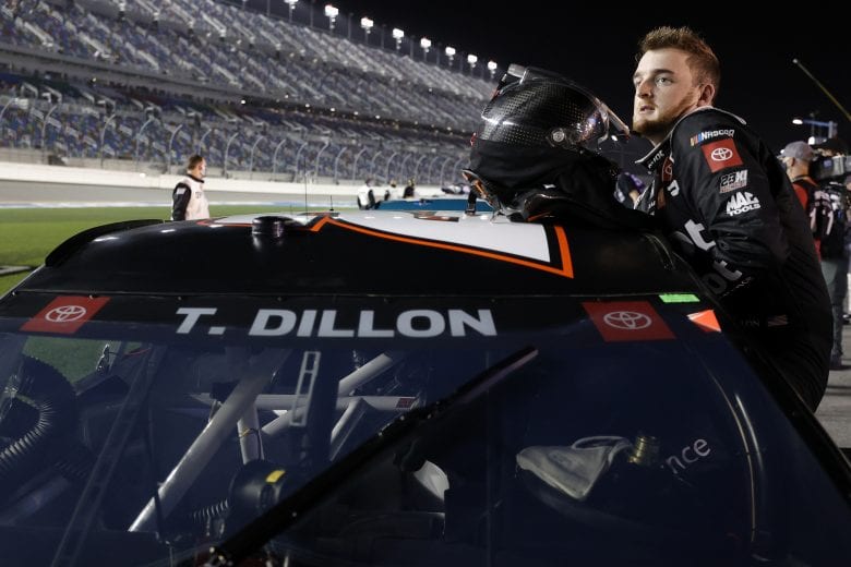 DAYTONA BEACH, FLORIDA - FEBRUARY 09: Ty Dillon, driver of the #23 Root Insurance Toyota, enters his car to start the NASCAR Cup Series Busch Clash at Daytona at Daytona International Speedway on February 09, 2021 in Daytona Beach, Florida. (Photo by Jared C. Tilton/Getty Images) | Getty Images