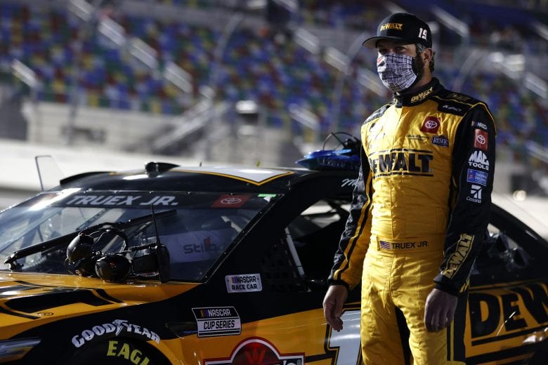 DAYTONA BEACH, FLORIDA - FEBRUARY 09: Martin Truex Jr., driver of the #19 DeWalt Toyota, waits on the grid prior to the NASCAR Cup Series Busch Clash at Daytona at Daytona International Speedway on February 09, 2021 in Daytona Beach, Florida. (Photo by Jared C. Tilton/Getty Images) | Getty Images