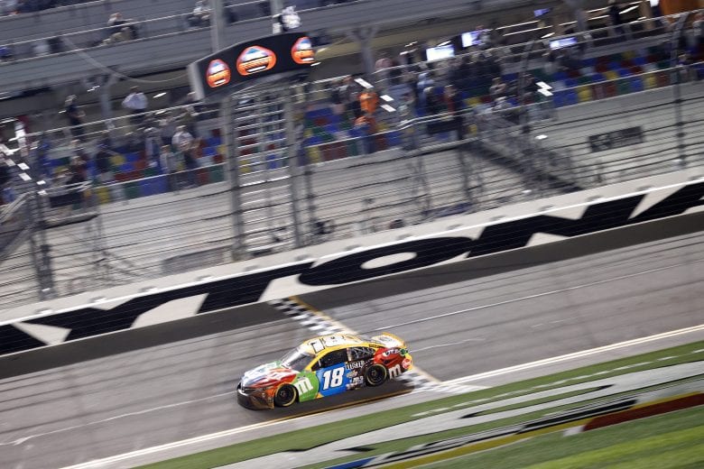 DAYTONA BEACH, FLORIDA - FEBRUARY 09: Kyle Busch, driver of the #18 M&M's Toyota, cross the finish line to win the NASCAR Cup Series Busch Clash at Daytona at Daytona International Speedway on February 09, 2021 in Daytona Beach, Florida. (Photo by Chris Graythen/Getty Images) | Getty Images