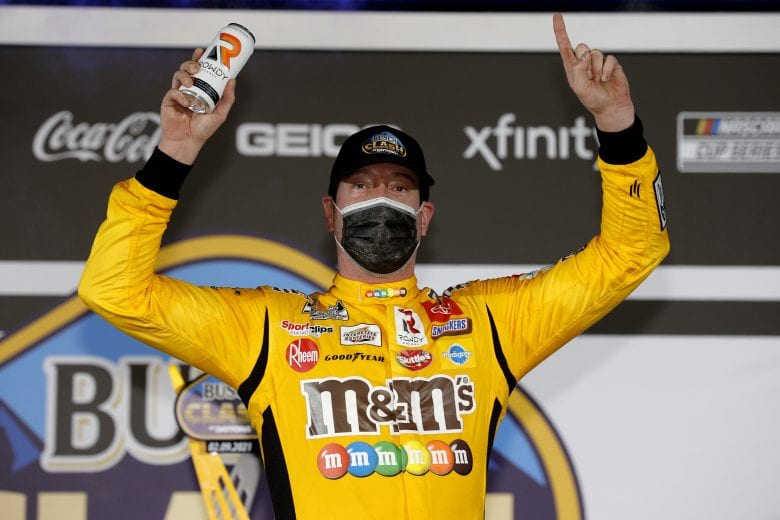 DAYTONA BEACH, FLORIDA - FEBRUARY 09: Kyle Busch, driver of the #18 M&M's Toyota, celebrates in Victory Lane after winning the NASCAR Cup Series Busch Clash at Daytona at Daytona International Speedway on February 09, 2021 in Daytona Beach, Florida. (Photo by Chris Graythen/Getty Images) | Getty Images