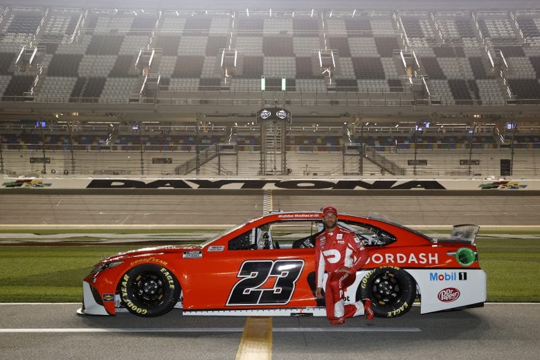 DAYTONA BEACH, FLORIDA - FEBRUARY 10: Bubba Wallace, driver of the #23 DoorDash Toyota, poses for photos during qualifying for the NASCAR Cup Series 63rd Annual Daytona 500 at Daytona International Speedway on February 10, 2021 in Daytona Beach, Florida. (Photo by Jared C. Tilton/Getty Images) | Getty Images