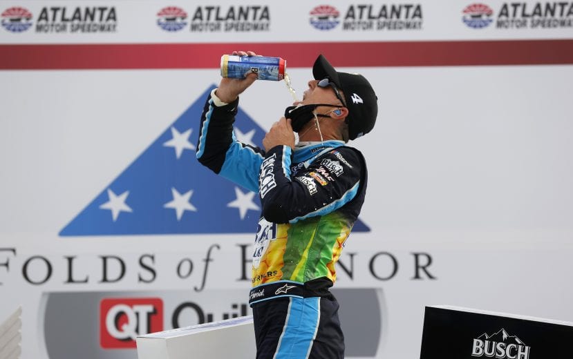 HAMPTON, GEORGIA - JUNE 07: Kevin Harvick, driver of the #4 Busch Light For The Farmers Ford, celebrates in Victory Lane after winning the NASCAR Cup Series Folds of Honor QuikTrip 500 at Atlanta Motor Speedway on June 07, 2020 in Hampton, Georgia. (Photo by Chris Graythen/Getty Images) | Getty Images