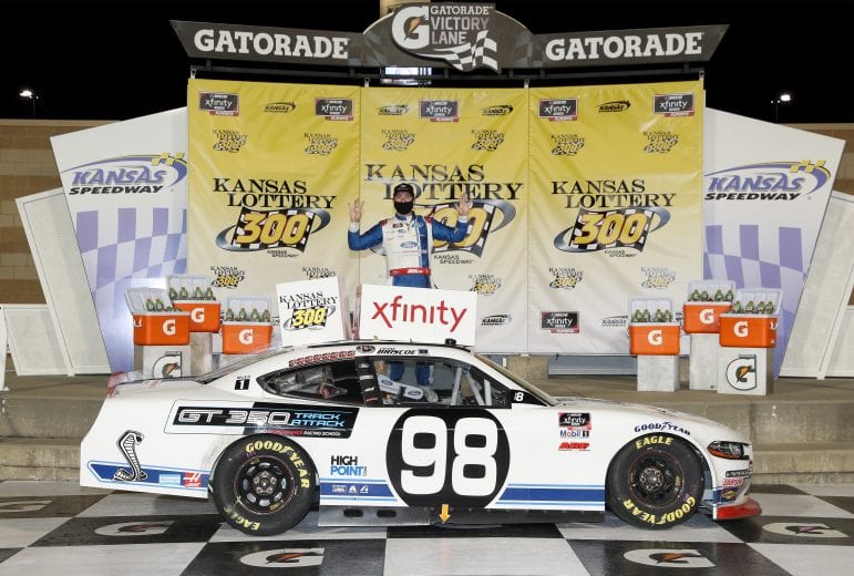 KANSAS CITY, KANSAS - OCTOBER 17: Chase Briscoe, driver of the #98 Ford Performance Racing School Ford, celebrates in victory lane after winning the NASCAR Xfinity Series Kansas Lottery 300 at Kansas Speedway on October 17, 2020 in Kansas City, Kansas. (Photo by Chris Graythen/Getty Images) | Getty Images