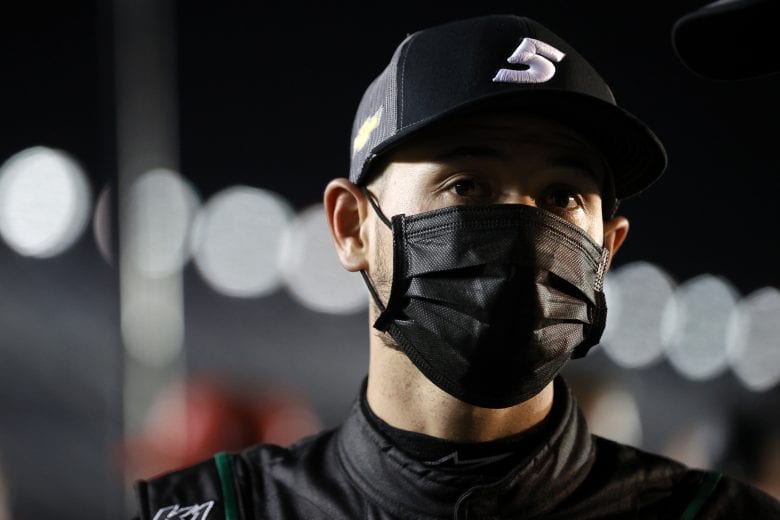 DAYTONA BEACH, FLORIDA - FEBRUARY 10: Kyle Larson, driver of the #5 Nations Guard Chevrolet, stands on the grid during qualifying for the NASCAR Cup Series 63rd Annual Daytona 500 at Daytona International Speedway on February 10, 2021 in Daytona Beach, Florida. (Photo by Chris Graythen/Getty Images) | Getty Images