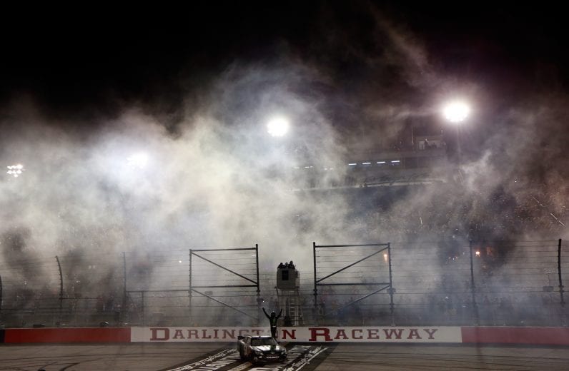 DARLINGTON, SC - MAY 10: Kyle Busch, driver of the #54 Monster Energy Toyota, celebrates by performing a burnout following his win in the NASCAR Nationwide Series VFW Sport Clips Help A Hero 200 at Darlington Raceway on May 10, 2013 in Darlington, South Carolina. (Photo by Chris Trotman/NASCAR via Getty Images)