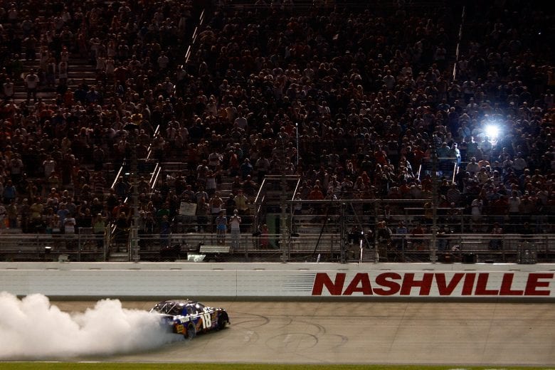 NASHVILLE, TN - JUNE 06: Kyle Busch, driver of the #18 NOS Energy Drink Toyota celebrates after winning the NASCAR Nationwide Series Federated Auto Parts 300 at the Nashville Superspeedway on June 6, 2009 in Lebanon,Tennessee. (Photo by Chris Graythen/Getty Images for NASCAR) | Getty Images