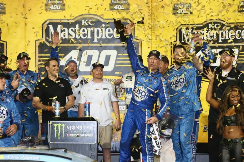KANSAS CITY, KS - MAY 12: Kevin Harvick, driver of the #4 Busch Light Ford, celebrates in victory lane after winning the Monster Energy NASCAR Cup Series KC Masterpiece 400 at Kansas Speedway on May 12, 2018 in Kansas City, Kansas. (Photo by Sarah Crabill/Getty Images) | Getty Images