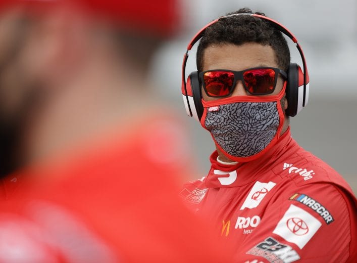 DAYTONA BEACH, FLORIDA - FEBRUARY 14: Bubba Wallace, driver of the #23 DoorDash Toyota, waits on the grid prior to the NASCAR Cup Series 63rd Annual Daytona 500 at Daytona International Speedway on February 14, 2021 in Daytona Beach, Florida. (Photo by Jared C. Tilton/Getty Images) | Getty Images