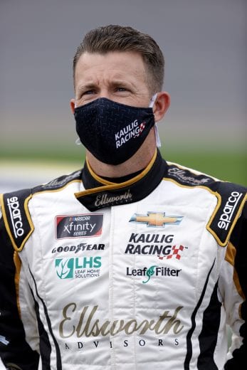 DAYTONA BEACH, FLORIDA - FEBRUARY 13: AJ Allmendinger, driver of the #16 Ellsworth Advisors Chevrolet, waits on the grid prior to  the NASCAR Xfinity Series Beef. It's What's For Dinner. 300 at Daytona International Speedway on February 13, 2021 in Daytona Beach, Florida. (Photo by Jared C. Tilton/Getty Images) | Getty Images