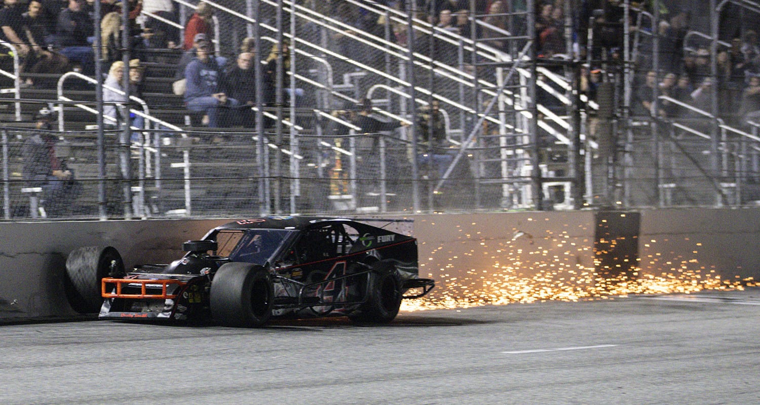 Cars race during the John Blewett III memorial tour Modified race at the New Smyrna Speedway in New Smyrna Beach, Florida on February 10, 2021. (James Gilbert/ARCA Racing)
