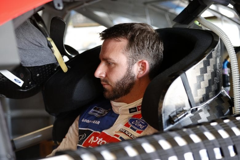 DAYTONA BEACH, FLORIDA - FEBRUARY 10: Matt DiBenedetto, driver of the #21 Motorcraft/Quick Lane Ford, sits in his car in the garage area during practice for the NASCAR Cup Series 63rd Annual Daytona 500 at Daytona International Speedway on February 10, 2021 in Daytona Beach, Florida. (Photo by Chris Graythen/Getty Images) | Getty Images