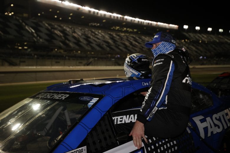 DAYTONA BEACH, FLORIDA - FEBRUARY 10: Chris Buescher, driver of the #17 Fastenal Ford, enters his car during qualifying for the NASCAR Cup Series 63rd Annual Daytona 500 at Daytona International Speedway on February 10, 2021 in Daytona Beach, Florida. (Photo by Chris Graythen/Getty Images) | Getty Images