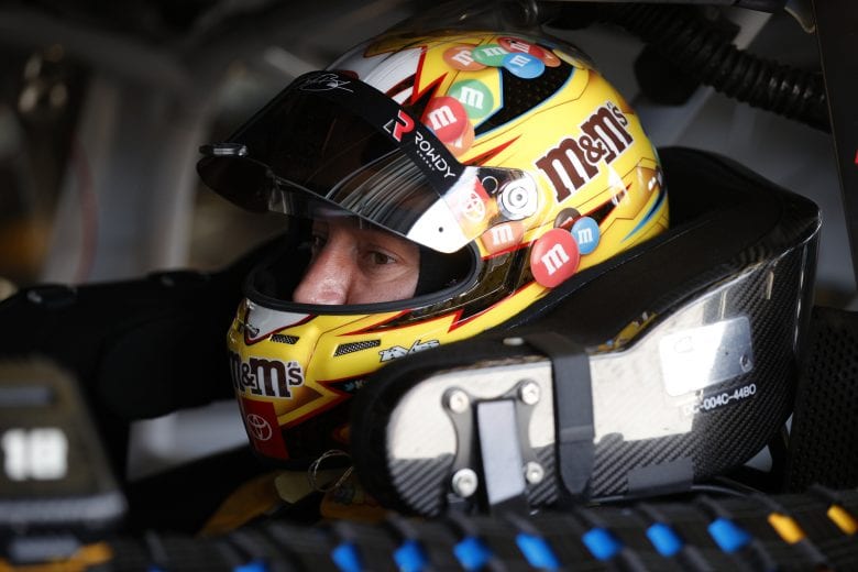DAYTONA BEACH, FLORIDA - FEBRUARY 10: Kyle Busch, driver of the #18 M&M's Toyota, sits in his car in the garage area during practice for the NASCAR Cup Series 63rd Annual Daytona 500 at Daytona International Speedway on February 10, 2021 in Daytona Beach, Florida. (Photo by Chris Graythen/Getty Images) | Getty Images