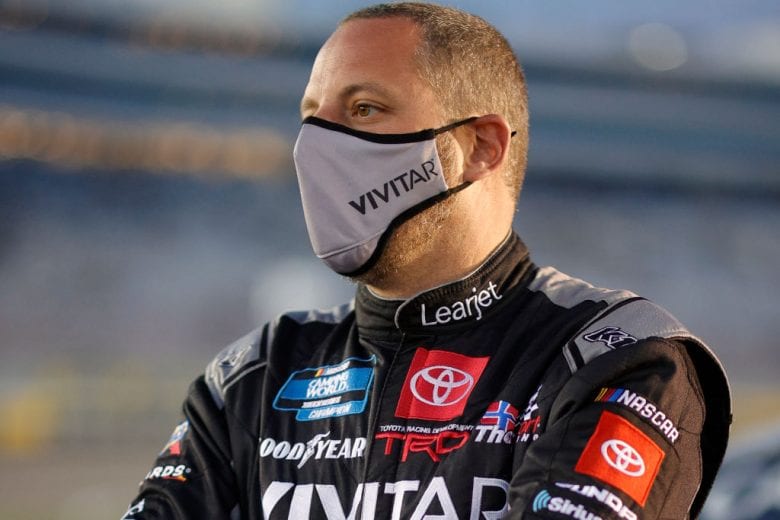 LAS VEGAS, NEVADA - MARCH 05: Johnny Sauter, driver of the #13 Vivitar/RealTree Toyota, waits on the grid prior to the NASCAR Camping World Truck Series Bucked Up 200 at The Bullring at Las Vegas Motor Speedway on March 05, 2021 in Las Vegas, Nevada. (Photo by Chris Graythen/Getty Images) | Getty Images
