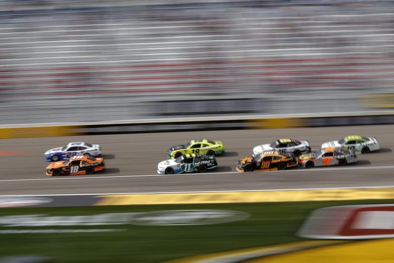 LAS VEGAS, NEVADA - MARCH 06: Daniel Hemric, driver of the #18 Poppy Bank Toyota, and Austin Cindric, driver of the #22 Carquest Auto Parts Ford, lead the field during the NASCAR Xfinity Series Alsco Uniforms 300 at The Bullring at Las Vegas Motor Speedway on March 06, 2021 in Las Vegas, Nevada. (Photo by Chris Graythen/Getty Images) | Getty Images