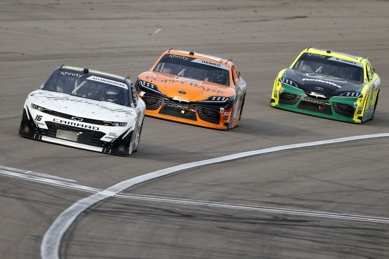 LAS VEGAS, NEVADA - MARCH 06: AJ Allmendinger, driver of the #16 Ellsworth Advisors Chevrolet, leads Daniel Hemric, driver of the #18 Poppy Bank Toyota, and Brandon Jones, driver of the #19 Menards/Turtle Wax Toyota, during the NASCAR Xfinity Series Alsco Uniforms 300 at The Bullring at Las Vegas Motor Speedway on March 06, 2021 in Las Vegas, Nevada. (Photo by Brian Lawdermilk/Getty Images) | Getty Images