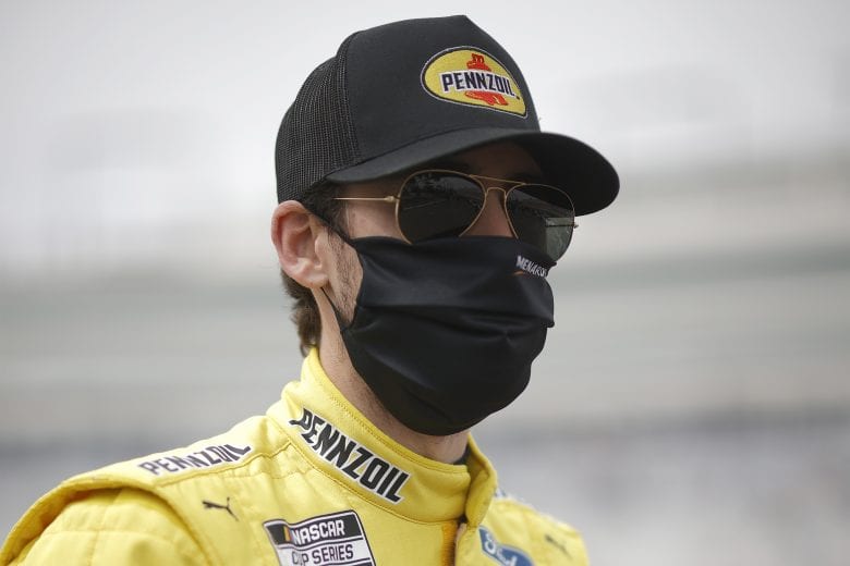 LAS VEGAS, NEVADA - MARCH 07: Ryan Blaney, driver of the #12 Menards/Pennzoil Ford, waits on the grid prior to the NASCAR Cup Series Pennzoil 400 presented by Jiffy Lube at Las Vegas Motor Speedway on March 07, 2021 in Las Vegas, Nevada. (Photo by Chris Graythen/Getty Images) | Getty Images