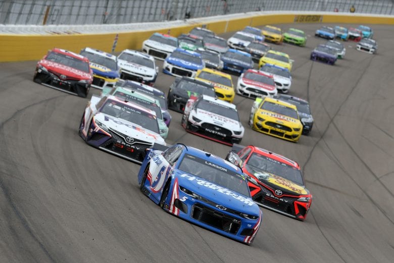 LAS VEGAS, NEVADA - MARCH 07: Kyle Larson, driver of the #5 HendrickCars.com Chevrolet, leads the field during the NASCAR Cup Series Pennzoil 400 presented by Jiffy Lube at the Las Vegas Motor Speedway on March 07, 2021 in Las Vegas, Nevada. (Photo by Brian Lawdermilk/Getty Images) | Getty Images