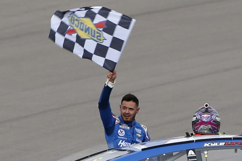 LAS VEGAS, NEVADA - MARCH 07: Kyle Larson, driver of the #5 HendrickCars.com Chevrolet, celebrates with the checkered flag after winning the NASCAR Cup Series Pennzoil 400 presented by Jiffy Lube at the Las Vegas Motor Speedway on March 07, 2021 in Las Vegas, Nevada. (Photo by Brian Lawdermilk/Getty Images) | Getty Images
