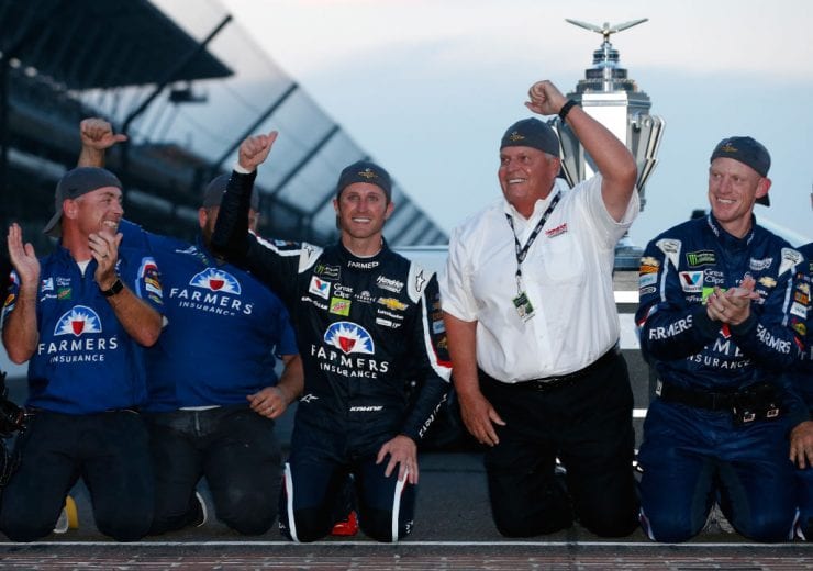 INDIANAPOLIS, IN - JULY 23:  Kasey Kahne, driver of the #5 Farmers Insurance Chevrolet, celebrates with team owner Rick Hendrick and his crew after winning the Monster Energy NASCAR Cup Series Brickyard 400 at Indianapolis Motorspeedway on July 23, 2017 in Indianapolis, Indiana.  (Photo by Brian Lawdermilk/Getty Images) | Getty Images