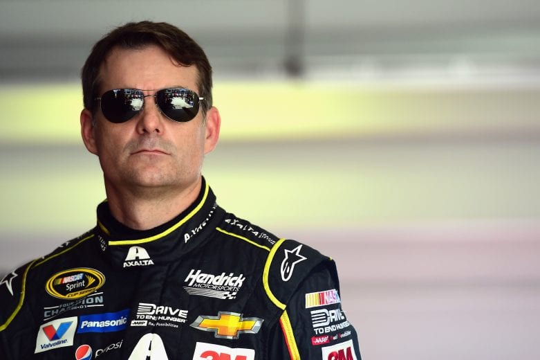 HOMESTEAD, FL - NOVEMBER 20:  Jeff Gordon, driver of the #24 AXALTA Chevrolet, stands in the garage area during practice for the NASCAR Sprint Cup Series Ford EcoBoost 400 at Homestead-Miami Speedway on November 20, 2015 in Homestead, Florida.  (Photo by Jared C. Tilton/NASCAR via Getty Images)