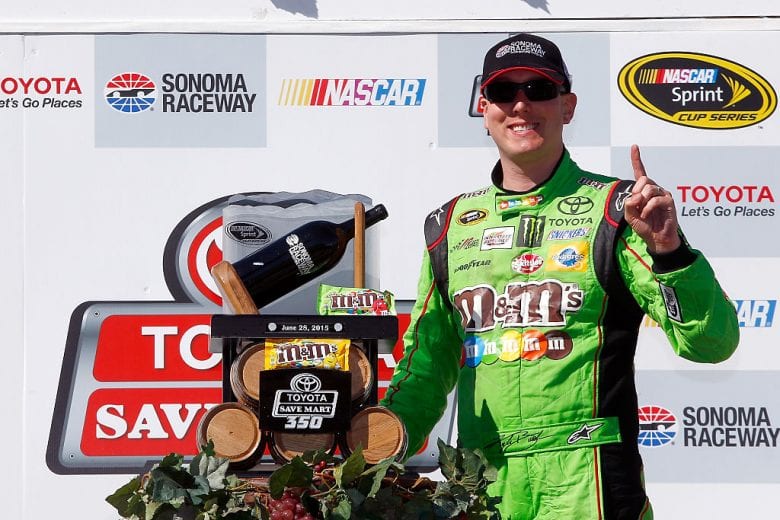 SONOMA, CA - JUNE 28:  Kyle Busch, driver of the #18 M&M's Crispy Toyota, poses with the trophy after winning the NASCAR Sprint Cup Series Toyota/Save Mart 350 at Sonoma Raceway on June 28, 2015 in Sonoma, California.  (Photo by Jerry Markland/Getty Images) | Getty Images