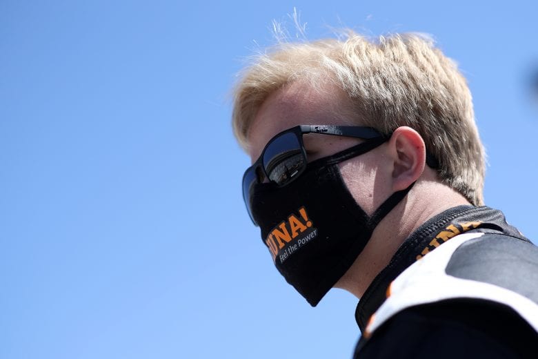HAMPTON, GEORGIA - MARCH 20: Tyler Ankrum, driver of the #26 LiUNA! Chevrolet, waits on the grid prior to the NASCAR Camping World Truck Series Fr8Auctions 200 at Atlanta Motor Speedway on March 20, 2021 in Hampton, Georgia. (Photo by Sean Gardner/Getty Images) | Getty Images