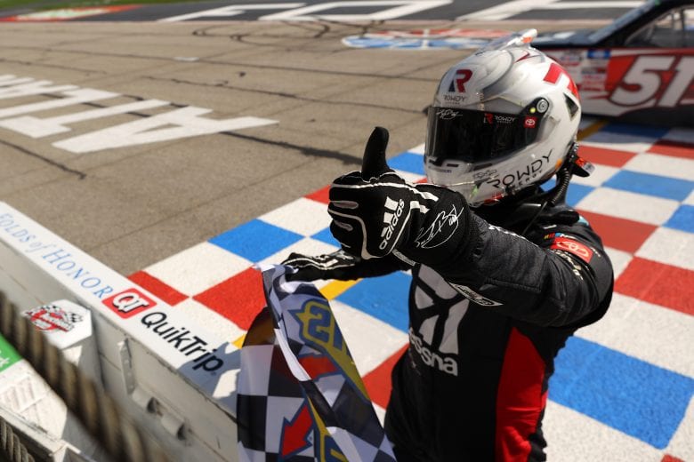 HAMPTON, GEORGIA - MARCH 20: Kyle Busch, driver of the #51 Cessna Toyota, celebrates with the checkered flag after winning the NASCAR Camping World Truck Series Fr8Auctions 200 at Atlanta Motor Speedway on March 20, 2021 in Hampton, Georgia. (Photo by Kevin C. Cox/Getty Images) | Getty Images
