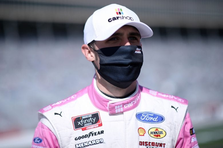 HAMPTON, GEORGIA - MARCH 20: Austin Cindric, driver of the #22 Car Shop Ford, waits on the grid prior to the NASCAR Xfinity Series EchoPark 250 at Atlanta Motor Speedway on March 20, 2021 in Hampton, Georgia. (Photo by Sean Gardner/Getty Images) | Getty Images