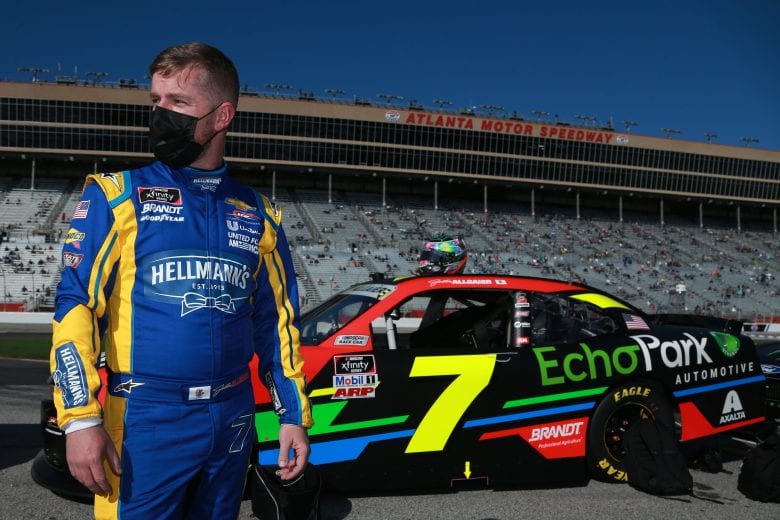 HAMPTON, GEORGIA - MARCH 20: Justin Allgaier, driver of the #7 Axalta/EchoPark Automotive Chevrolet, waits on the grid prior to the NASCAR Xfinity Series EchoPark 250 at Atlanta Motor Speedway on March 20, 2021 in Hampton, Georgia. (Photo by Sean Gardner/Getty Images) | Getty Images