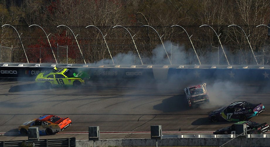 HAMPTON, GEORGIA - MARCH 20: Brandon Jones, driver of the #19 Menards/Pentair Toyota, and Harrison Burton, driver of the #20 DEX Imaging Toyota, spin after an on-track incident during the NASCAR Xfinity Series EchoPark 250 at Atlanta Motor Speedway on March 20, 2021 in Hampton, Georgia. (Photo by Kevin C. Cox/Getty Images) | Getty Images