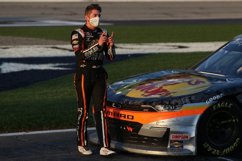 HAMPTON, GEORGIA - MARCH 20: Noah Gragson, driver of the #9 Bass Pros Shops/TrueTimber/BRCC Chevrolet, exits his car after the NASCAR Xfinity Series EchoPark 250 at Atlanta Motor Speedway on March 20, 2021 in Hampton, Georgia. (Photo by Sean Gardner/Getty Images) | Getty Images