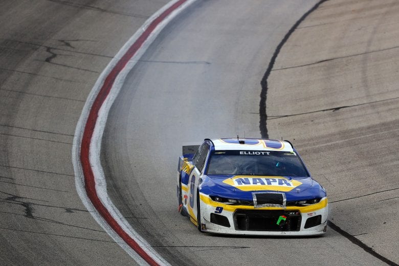 HAMPTON, GEORGIA - MARCH 21: Smoke is seen from the #9 NAPA Auto Parts Chevrolet, driven by Chase Elliott, during the NASCAR Cup Series Folds of Honor QuikTrip 500 at Atlanta Motor Speedway on March 21, 2021 in Hampton, Georgia. (Photo by Kevin C. Cox/Getty Images) | Getty Images