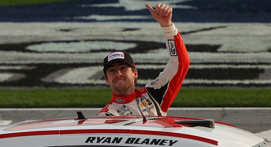 HAMPTON, GEORGIA - MARCH 21: Ryan Blaney, driver of the #12 BodyArmor Ford, celebrates after winning the NASCAR Cup Series Folds of Honor QuikTrip 500 at Atlanta Motor Speedway on March 21, 2021 in Hampton, Georgia. (Photo by Kevin C. Cox/Getty Images) | Getty Images