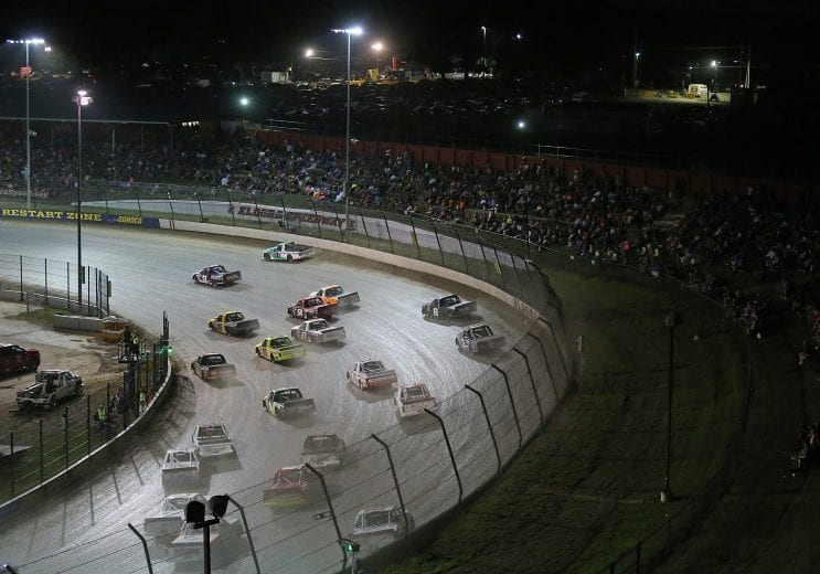ROSSBURG, OH - JULY 18: Ben Rhodes, driver of the #41 The Carolina Nut Co. Ford, leads a pack of trucks during the NASCAR Camping World Truck Series Eldora Dirt Derby at Eldora Speedway on July 18, 2018 in Rossburg, Ohio. (Photo by Matt Sullivan/Getty Images) | Getty Images