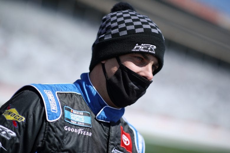 HAMPTON, GEORGIA - MARCH 20: Stewart Friesen, driver of the #52 Halmar International Toyota, waits on the grid prior to the NASCAR Camping World Truck Series Fr8Auctions 200 at Atlanta Motor Speedway on March 20, 2021 in Hampton, Georgia. (Photo by Sean Gardner/Getty Images) | Getty Images