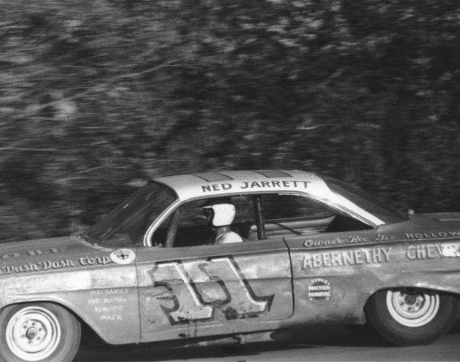 1961: Ned Jarrett guides his Chevrolet around a dirt track during a 1961 NASCAR Cup race. Although he won only one race during the year, Jarrett was consistent, finishing 34 times in the top 10 in scoring his first NASCAR Cup championship. (Photo by ISC Images & Archives via Getty Images)