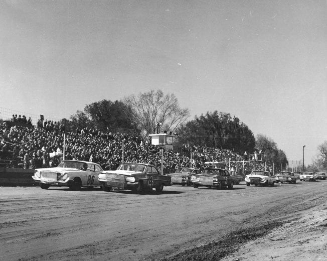 SAVANNAH, GA - MARCH 17, 1962: Rex White's No. 4 '61 Chevy started on the pole next to Darel Dieringer's Buck Baker owned No. 86, a 1961 Chrysler in the 'St. Patrick's Day 200' at the half-mile, Savannah Speedway dirt track. Jack Smith took the win over Cotton Owens and Joe Weatherly. (Photo by ISC Archives/CQ-Roll Call Group via Getty Images)