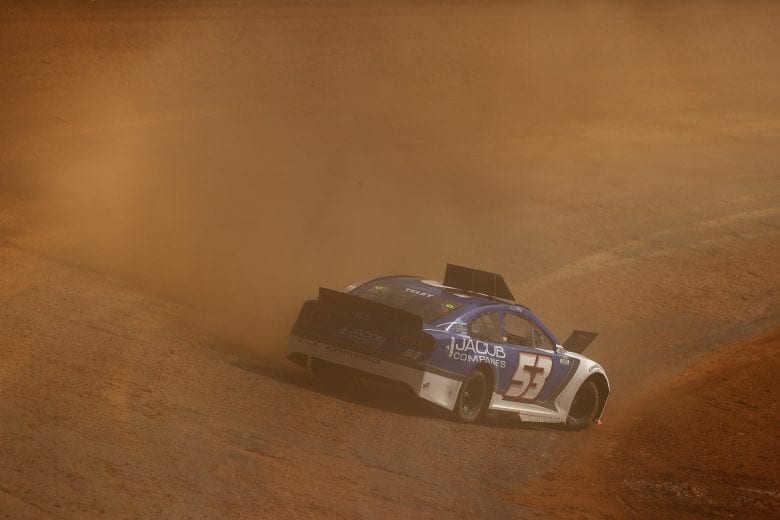 BRISTOL, TENNESSEE - MARCH 26: JJ Yeley, driver of the #53 Rick Ware Racing Chevrolet, spins during practice for the NASCAR Cup Series Food City Dirt Race at Bristol Motor Speedway on March 26, 2021 in Bristol, Tennessee. (Photo by Jared C. Tilton/Getty Images) | Getty Images