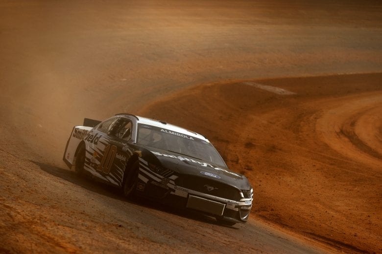BRISTOL, TENNESSEE - MARCH 26: Aric Almirola, driver of the #10 Smithfield Ford, drives during practice for the NASCAR Cup Series Food City Dirt Race at Bristol Motor Speedway on March 26, 2021 in Bristol, Tennessee. (Photo by Jared C. Tilton/Getty Images) | Getty Images