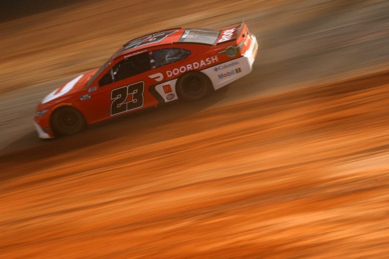 BRISTOL, TENNESSEE - MARCH 26: Bubba Wallace, driver of the #23 DoorDash Toyota, drives during practice for the NASCAR Cup Series Food City Dirt Race at Bristol Motor Speedway on March 26, 2021 in Bristol, Tennessee. (Photo by Chris Graythen/Getty Images) | Getty Images
