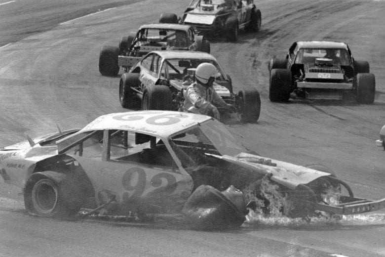 MARTINSVILLE, VA — April 21, 1979:  Steve Jones exits his car after a hard crash during the Azalea 150 NASCAR Modified race at Martinsville Speedway.  (Photo by ISC Images & Archives via Getty Images)