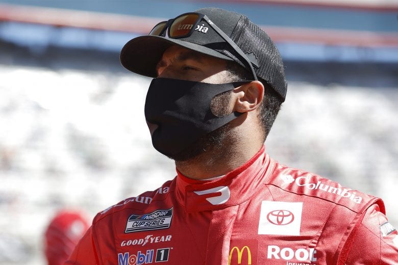 BRISTOL, TENNESSEE - MARCH 29: Bubba Wallace, driver of the #23 DoorDash Toyota, waits on the grid prior to the NASCAR Cup Series Food City Dirt Race at Bristol Motor Speedway on March 29, 2021 in Bristol, Tennessee. (Photo by Chris Graythen/Getty Images) | Getty Images