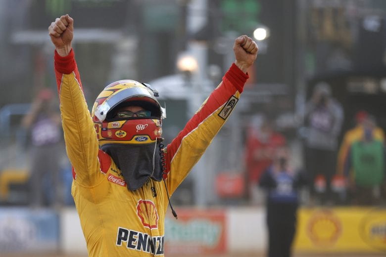 BRISTOL, TENNESSEE - MARCH 29: Joey Logano, driver of the #22 Shell Pennzoil Ford, celebrates winning the NASCAR Cup Series Food City Dirt Race at Bristol Motor Speedway on March 29, 2021 in Bristol, Tennessee. (Photo by Jared C. Tilton/Getty Images) | Getty Images