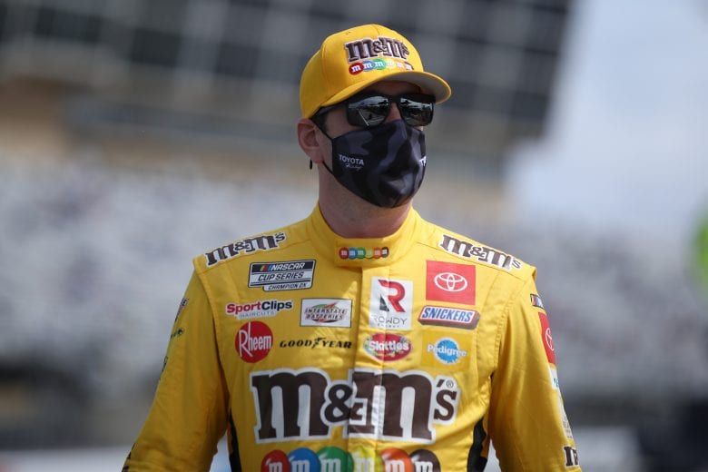 HAMPTON, GEORGIA - MARCH 21: Kyle Busch, driver of the #18 M&M's Messages Toyota, waits on the grid prior to the NASCAR Cup Series Folds of Honor QuikTrip 500 at Atlanta Motor Speedway on March 21, 2021 in Hampton, Georgia. (Photo by Sean Gardner/Getty Images) | Getty Images