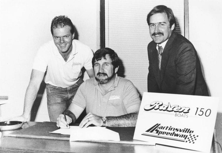 MARTINSVILLE, VA:  Clay Campbell of Martinsville (VA) Speedway (R) takes part in the signing of a contract with Raven Boats, sponsors of the NASCAR Modified tour races at Martinsville in 1989 and 1990.  (Photo by ISC Archives/CQ-Roll Call Group via Getty Images)