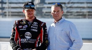 MARTINSVILLE, VA - OCTOBER 30: Jeb Burton, driver of the #23 Rocky Ridge/Estes Toyota, and his father Ward Burton stand on the grid during qualifying for the NASCAR Sprint Cup Series Goody's Headache Relief Shot 500 at Martinsville Speedway on October 30, 2015 in Martinsville, Virginia. (Photo by Todd Warshaw/NASCAR via Getty Images)