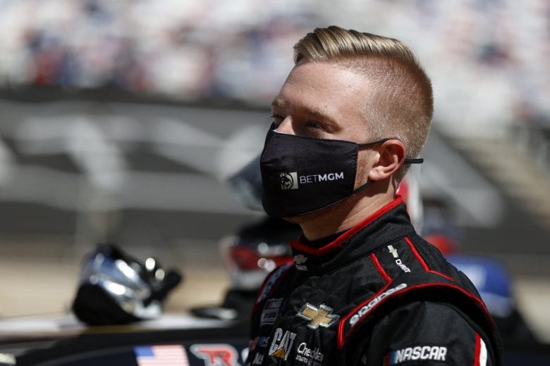 BRISTOL, TENNESSEE - MARCH 29: Tyler Reddick, driver of the #8 BetMGM Chevrolet, stands on the grid during the NASCAR Cup Series Food City Dirt Race at Bristol Motor Speedway on March 29, 2021 in Bristol, Tennessee. (Photo by Chris Graythen/Getty Images) | Getty Images